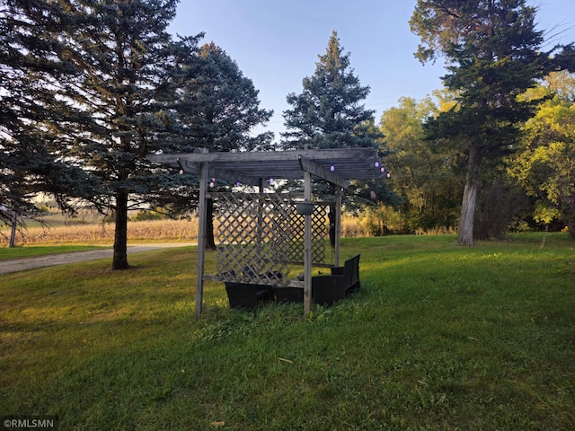 view of yard with a pergola