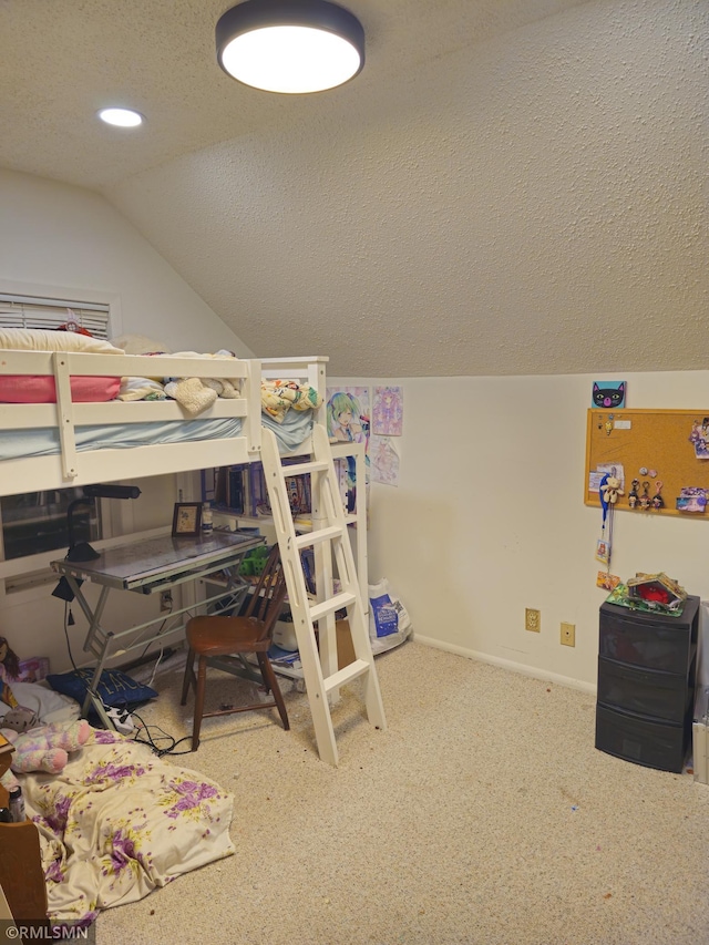 bedroom featuring a textured ceiling, lofted ceiling, and carpet flooring