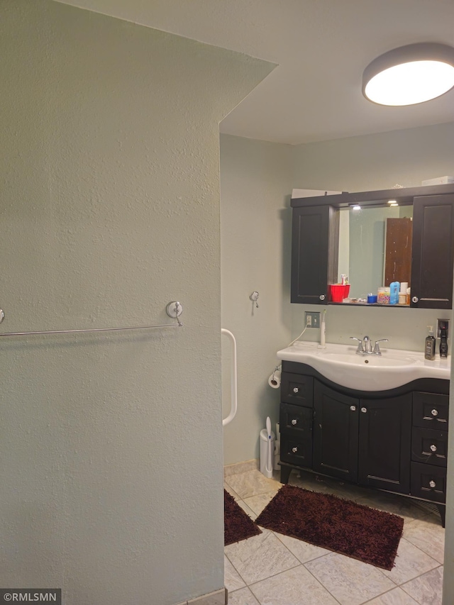 bathroom featuring vanity and tile patterned floors