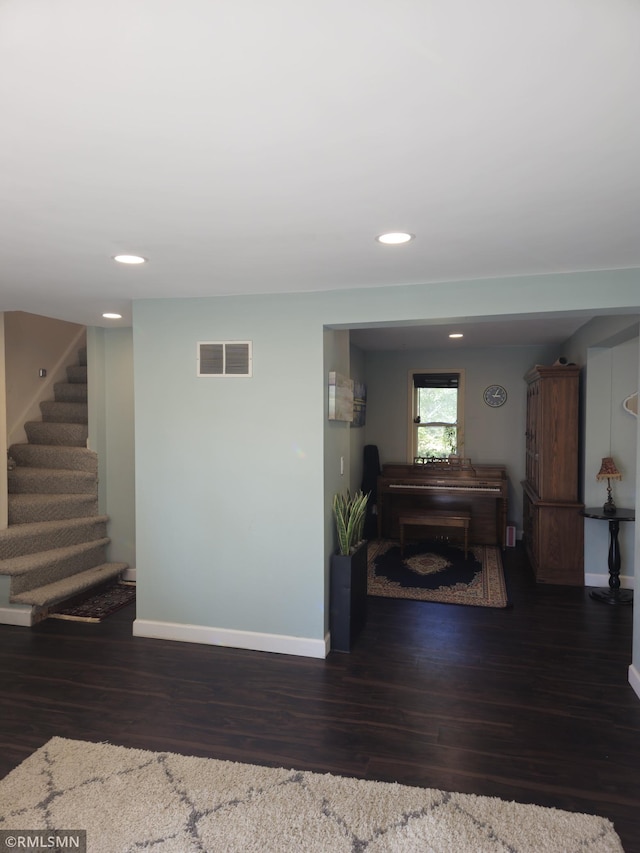 living room with dark wood-type flooring