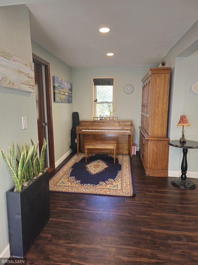 miscellaneous room with dark hardwood / wood-style floors