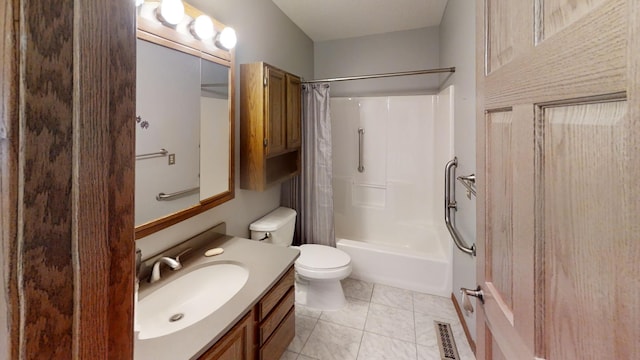 full bathroom featuring shower / bath combo, tile patterned floors, toilet, and vanity