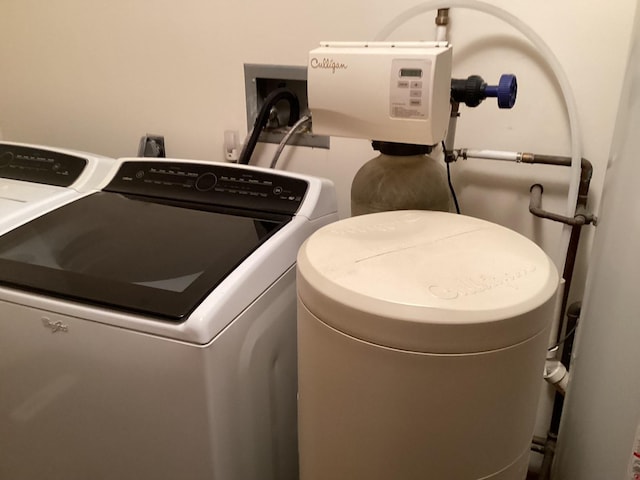 laundry room with independent washer and dryer