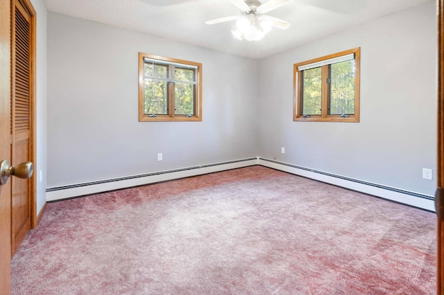 unfurnished bedroom with light carpet, multiple windows, and ceiling fan