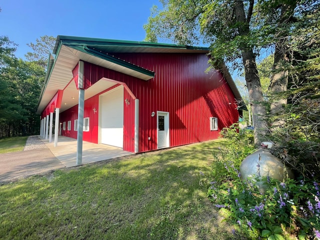 40038 Pearl St, Emily, MN 56447 - view of pole building featuring a yard and driveway