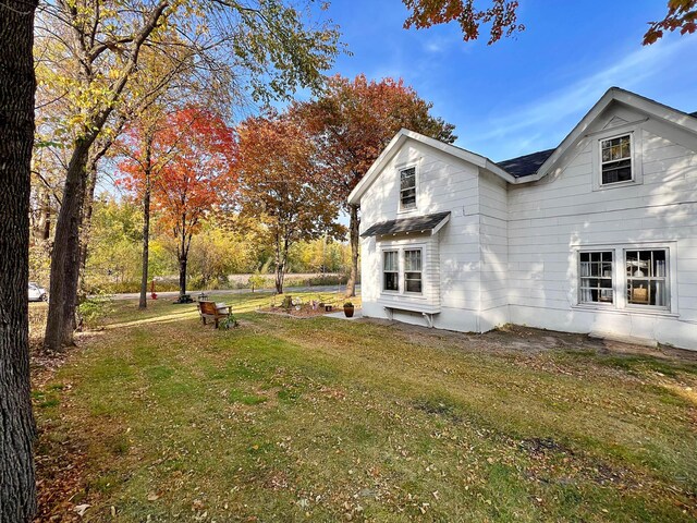 exterior space with a yard