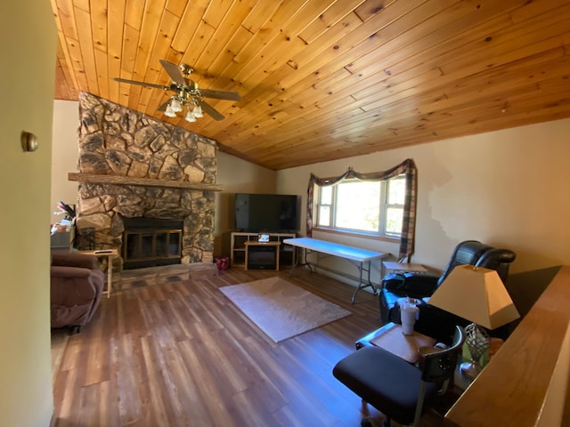 living room with hardwood / wood-style flooring, wooden ceiling, a fireplace, and vaulted ceiling