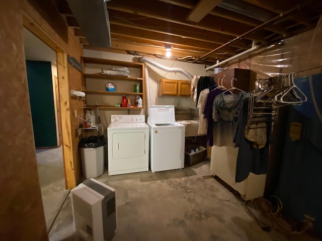 basement with washer and clothes dryer