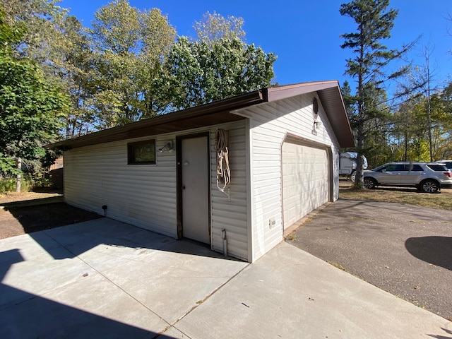 view of outbuilding with a garage