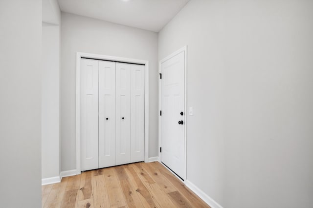 doorway to outside with light hardwood / wood-style flooring