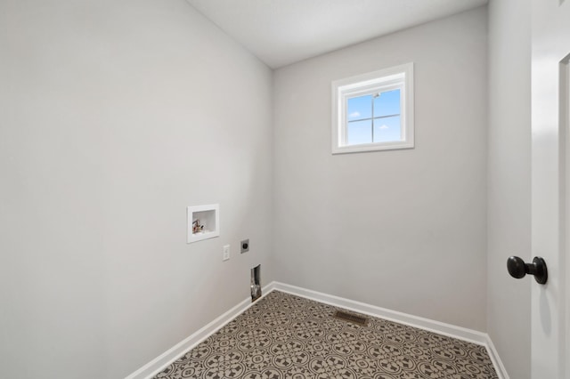 washroom with hookup for an electric dryer and hookup for a washing machine