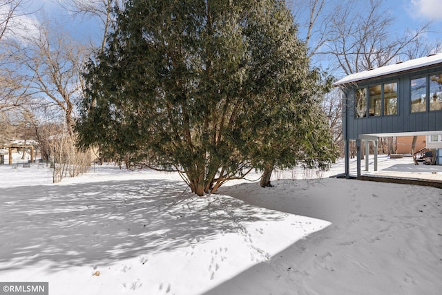 view of yard covered in snow