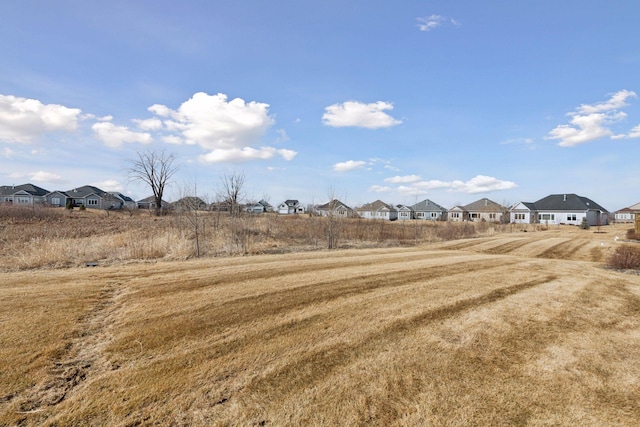 view of yard featuring a residential view