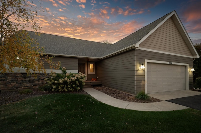 ranch-style house featuring a garage