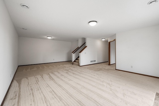 basement with light colored carpet