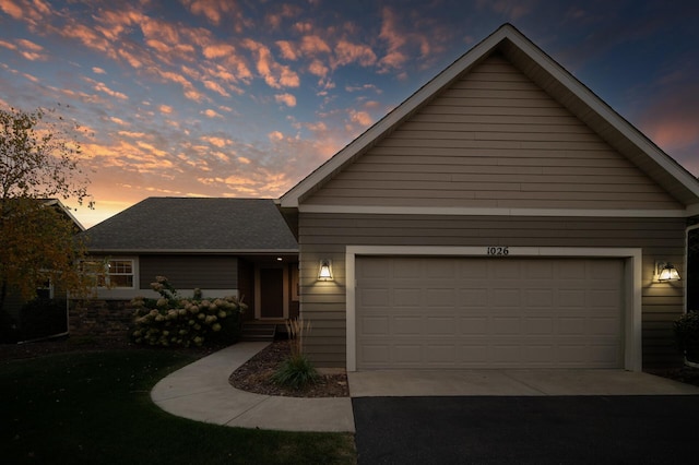 view of front of property featuring a garage