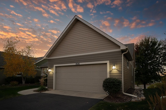 view of property exterior at dusk