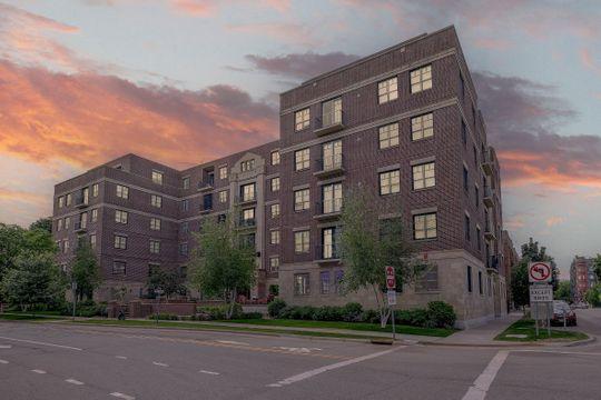 view of outdoor building at dusk