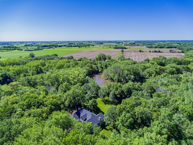 drone / aerial view with a water view and a rural view