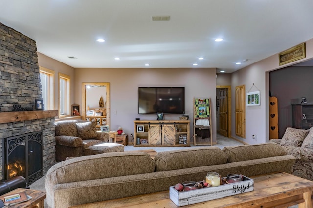 living room featuring a fireplace