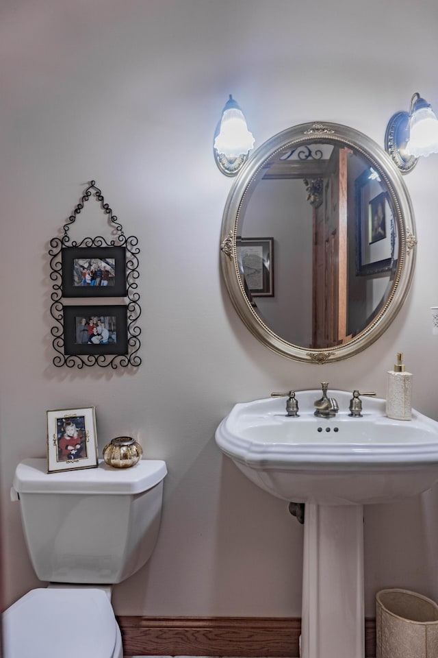 bathroom with toilet and sink