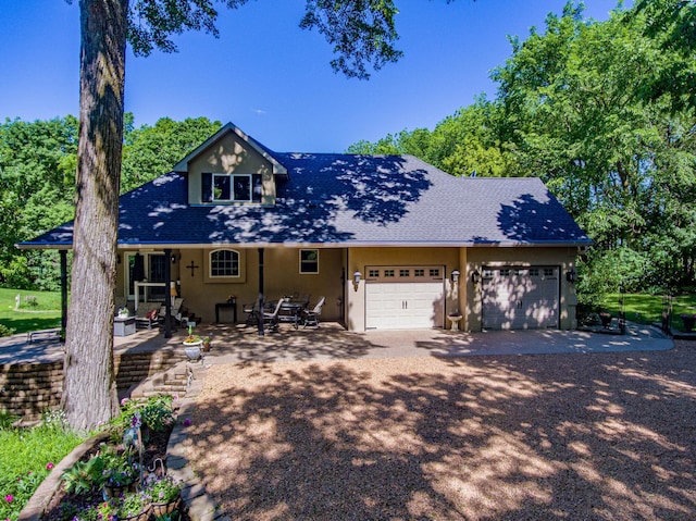 view of front of home with a garage