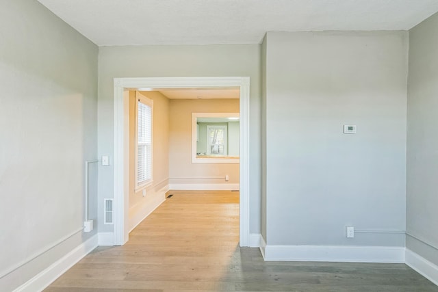 corridor featuring light hardwood / wood-style flooring