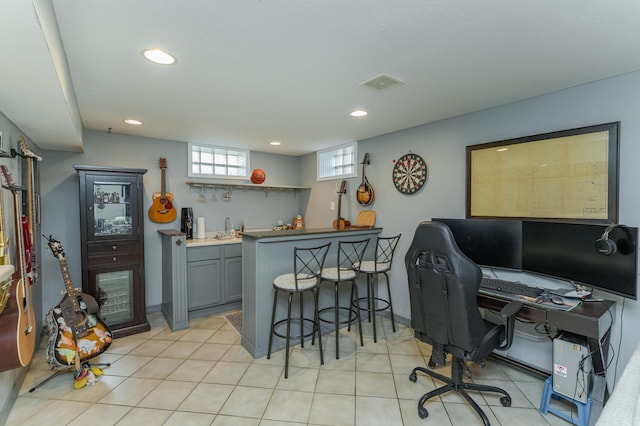 office featuring wet bar