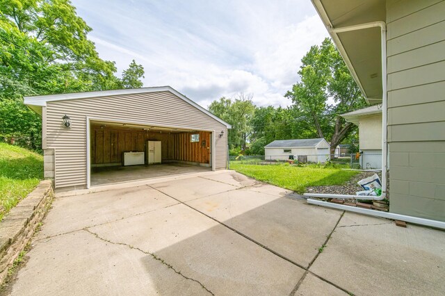 garage featuring a yard