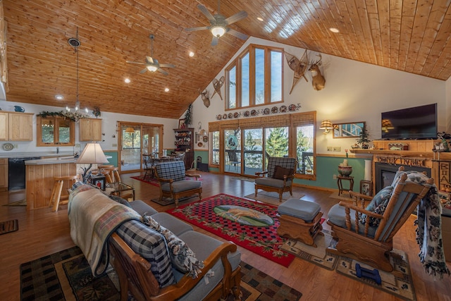 living room featuring high vaulted ceiling, plenty of natural light, hardwood / wood-style floors, and wooden ceiling