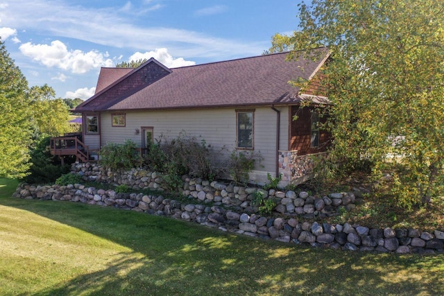 view of home's exterior featuring a lawn