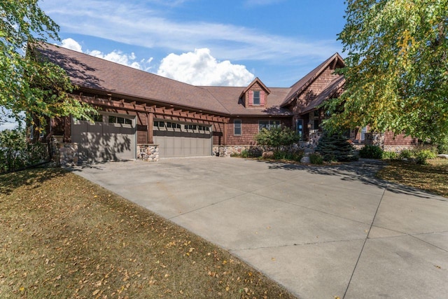 view of front of property featuring a garage