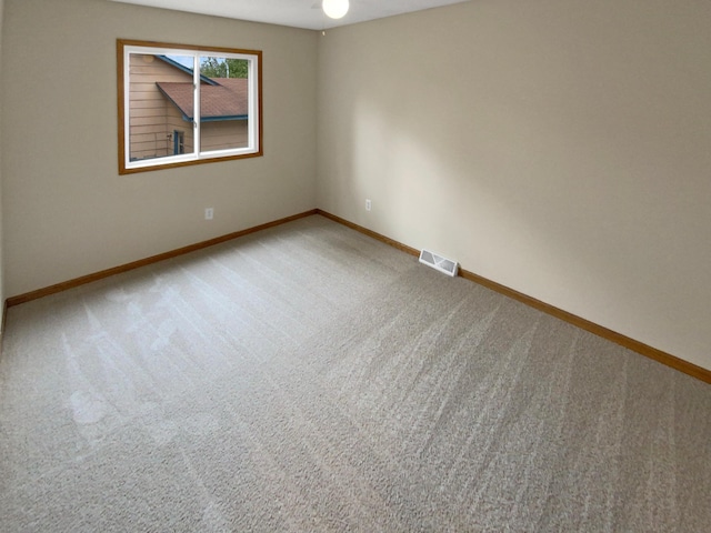 empty room featuring carpet