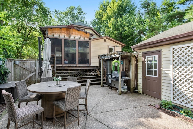 view of patio / terrace featuring a grill and a pergola