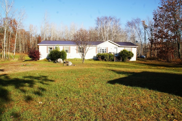 exterior space featuring a lawn