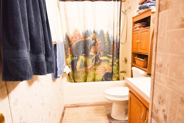 full bathroom featuring wood-type flooring, vanity, toilet, and shower / bath combo with shower curtain