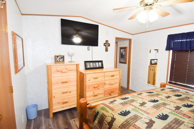 bedroom featuring dark hardwood / wood-style floors, ceiling fan, lofted ceiling, and ornamental molding