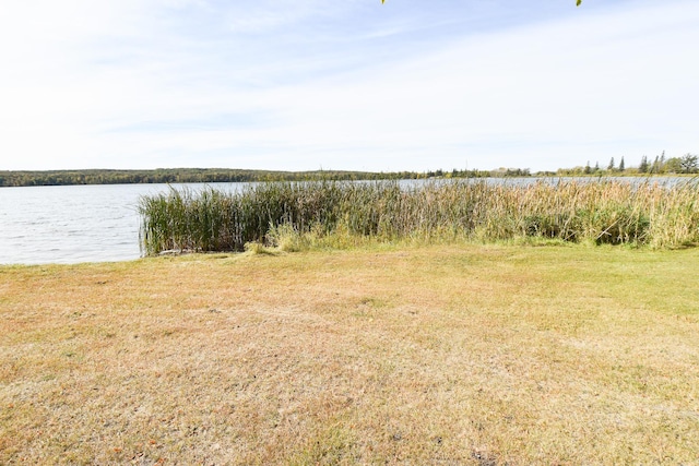 exterior space with a water view