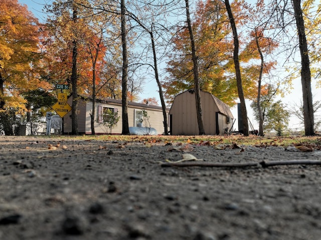 exterior space featuring a shed