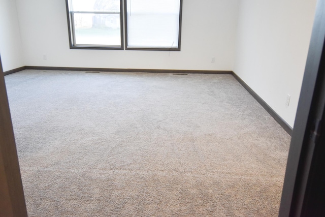 view of carpeted spare room