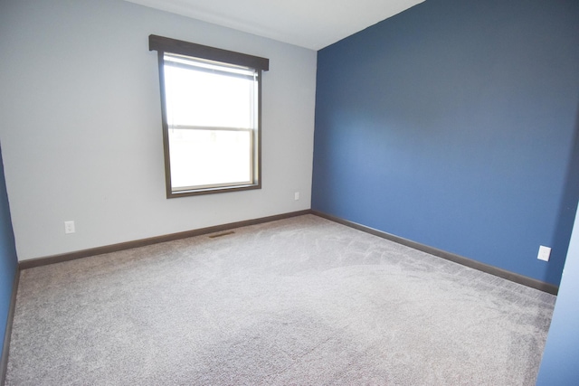 empty room with carpet floors