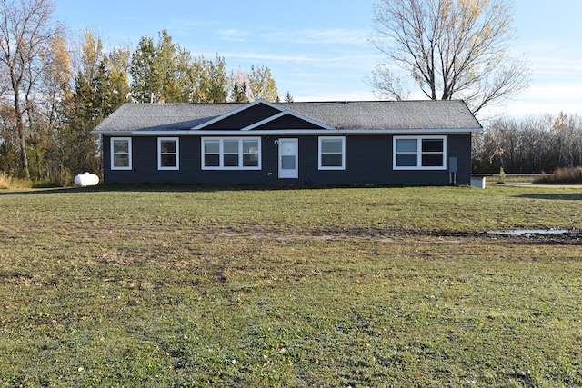 single story home with a front yard