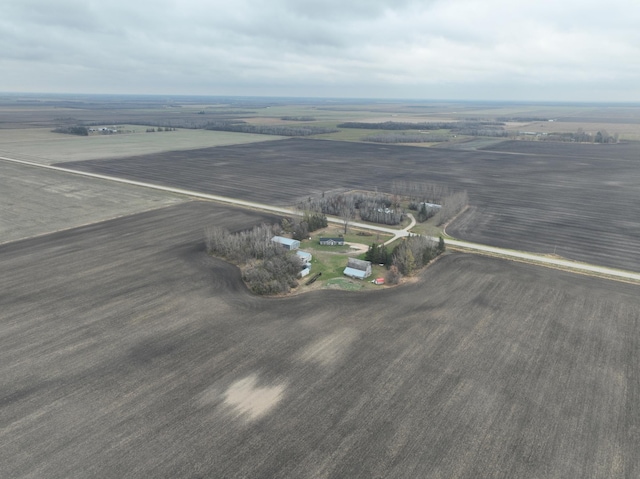 birds eye view of property featuring a rural view