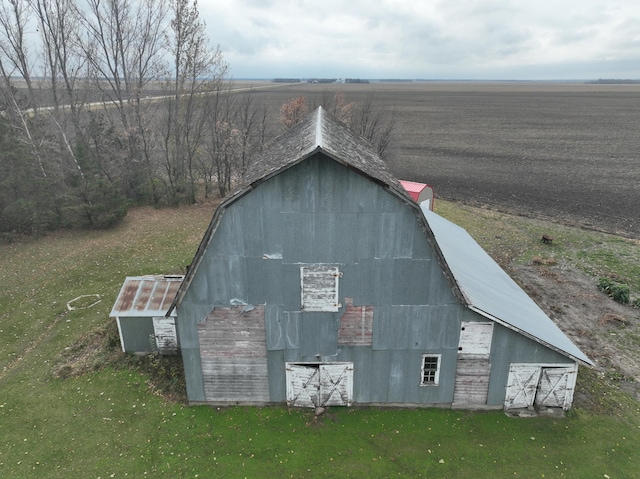 view of outbuilding featuring a rural view