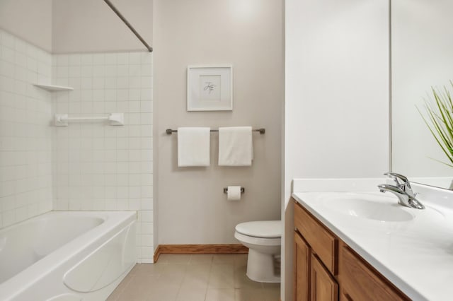 full bathroom with vanity, tiled shower / bath combo, toilet, and tile patterned flooring