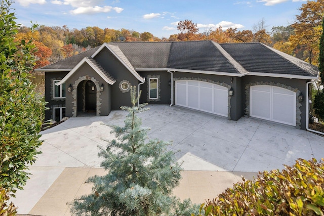 single story home with a garage