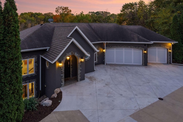 view of front of property featuring a garage