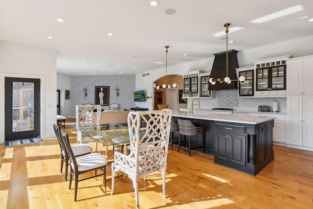 dining area with light hardwood / wood-style flooring