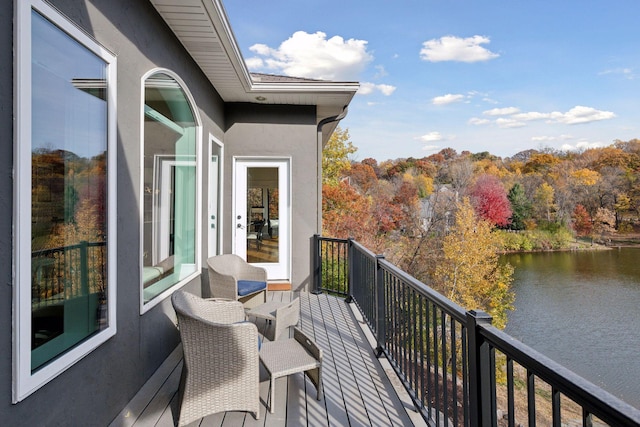 balcony featuring a water view