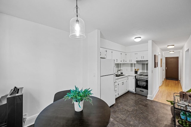 dining space featuring dark hardwood / wood-style flooring